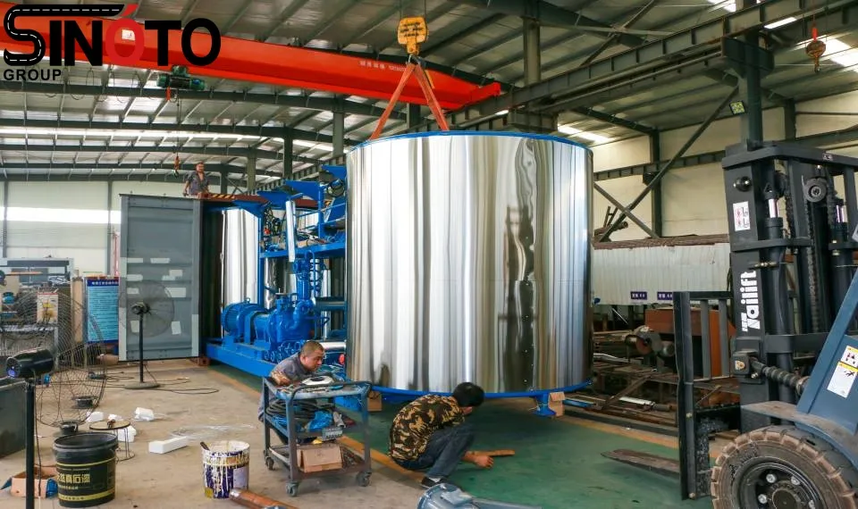 A detailed panoramic view of a complete, structured SINOTO polymer modified bitumen factory layout, including tanks, piping, the mill, and the control room.